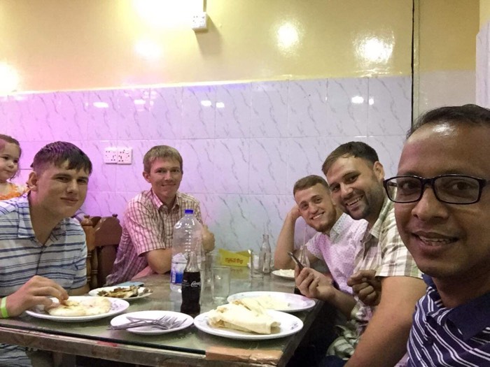 BLCC students sharing a meal together at a Dhaka restaurant